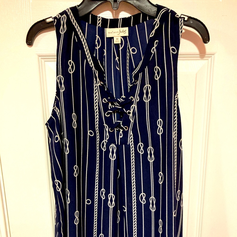 Sleeveless blue top with nautical knots